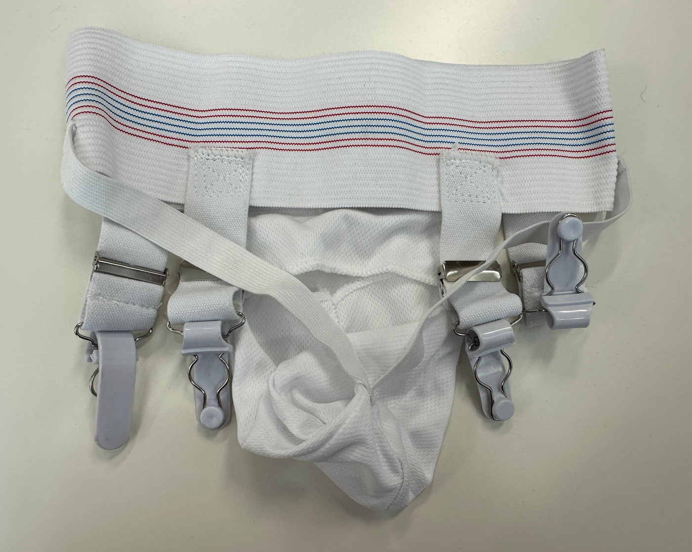 CEINTURE PORTE-JARRETELLES DE HOCKEY 3 EN 1 AVEC COQUILLE - JUNIOR